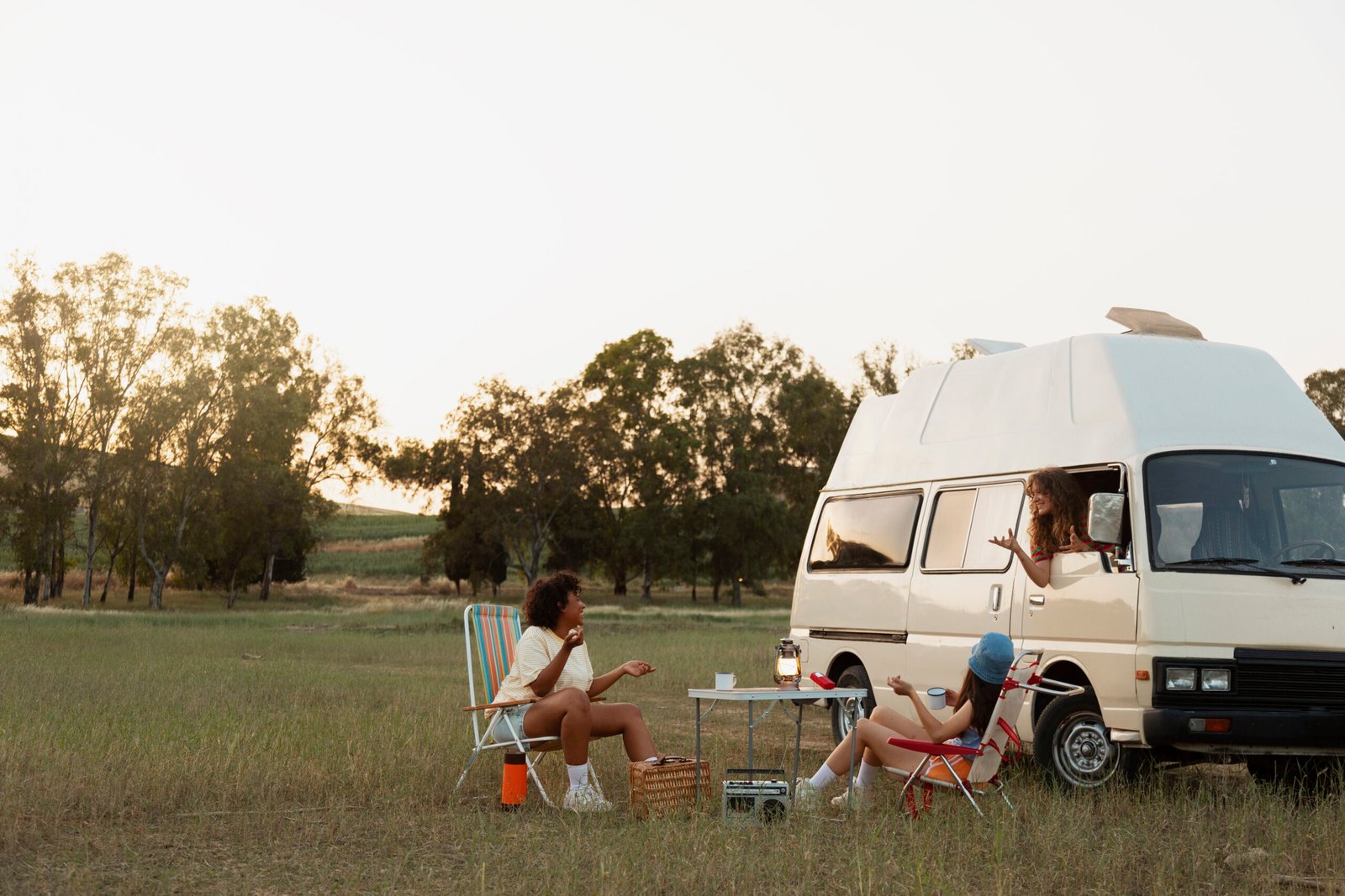 full-shot-friends-relaxing-outdoors